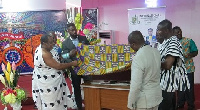 Very Rev. Felix Tawiah Danquah assisted by other members of the church to unveil the project