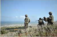 Soldiers with the African Union mission in Somalia look out for al-Shabab fighters