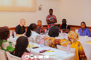 Foreign Trade Association official (in black) and AGAM members in a workshop