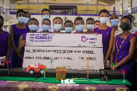 Mfantseman students display their winning cheque