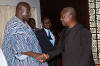 Suspended NPP chairman,  Paul Afoko [L] in a handshake with President Mahama