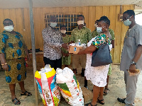 Lawyer Magnus Kofi Amoatey making a donation