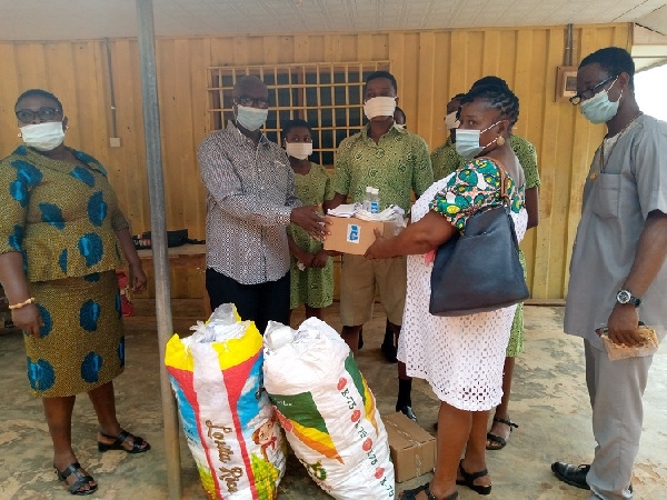 Lawyer Magnus Kofi Amoatey making a donation