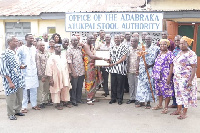 COCOBOD CEO presenting the citation to the Chief of Adabraka