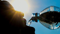 File photo of a person drinking water from a  plastic bottle