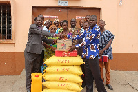 Rev. Abraham Ayiakwo presenting the items to the Prisons Service