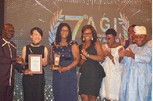 Staff of Nestle Ghana Limited pose for a picture after the award was handed over to them