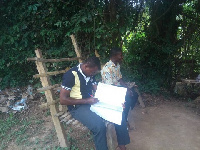 Teachers sitting under trees due to lack of staff room