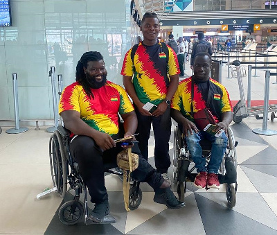 Coach Frank Toulassi with athletes Tahiru Haruna and Isaac Obeng