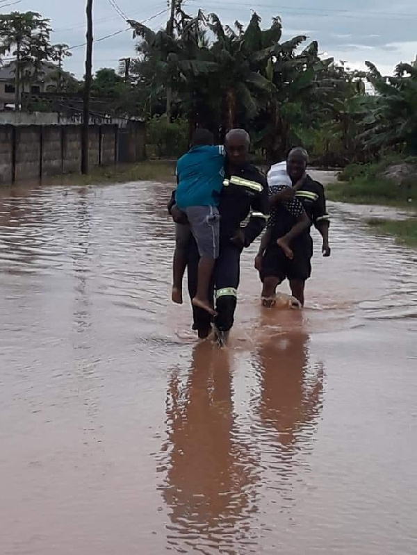 File photo of police officers recusing children