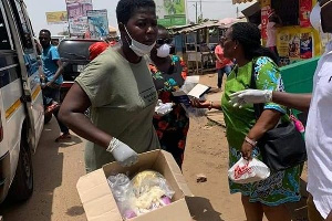 Scenes at the market when Perpetual Lomokie Akwada was sahring the face mask etc