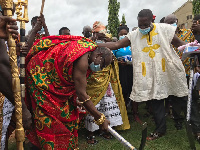 Nana Effah Openamang III cutting sod for a state-of-the-art palace at Nkawkaw