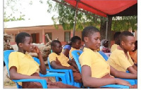 Junior High School pupils seated at an event