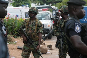 Soldiers And Police Patrols