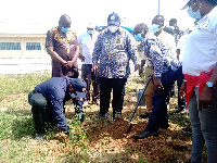 The  Vice-Chancellor, Prof. Samuel Nii Odai and staff during the planting exercise