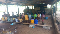 Kwabena Dwomo Krom pupils sitting on the bare floor in class