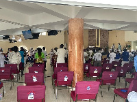 Church members practicing social distancing during a service