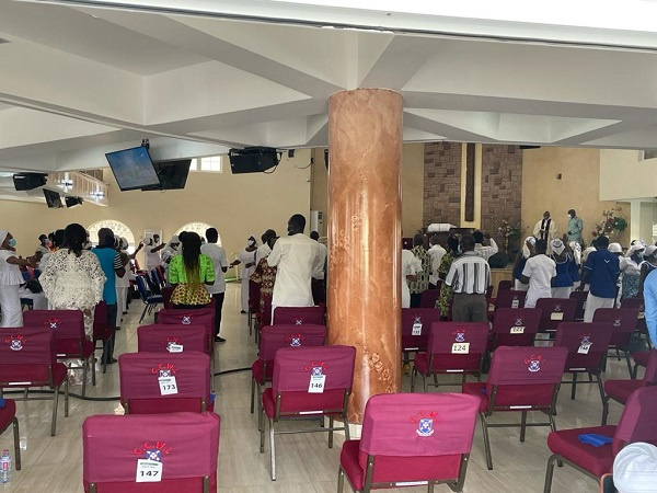 Congregants worshipping at a church