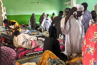 A ward at a hospital in el-Fasher in North Darfur is crowded with people wounded