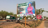 A campaign billboard on a busy street in Bamako, Mali