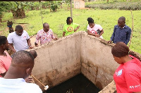 Vector Control unit of Zoomlion Ghana limited at a mosquito breeding site