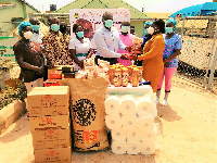 Officials of GTA handing over the items to beneficiaries