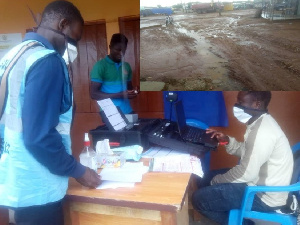 A few people defied the downpour to register