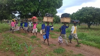 File photo: Some students leaving school with their belongings