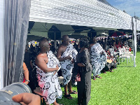 Prof. Jane Naana (in black) greets some mourners