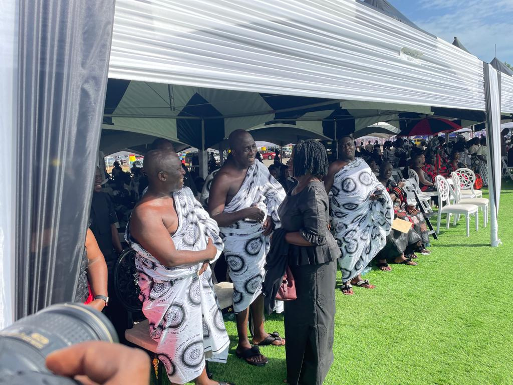 Prof. Jane Naana (in black) greets some mourners