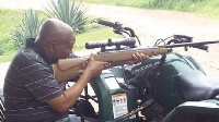 Jacob Zuma takes aim in rifle photo