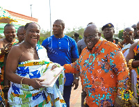 President Akufo-Addo presenting C.I. 114 to the delegation from the Ahafo Region