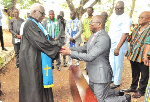 Benjamin Yawo Dei (right) officially inducted into office