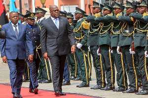 DR Congo President Felix Tshisekedi (centre) arrives to attend a regional security summit in Luanda