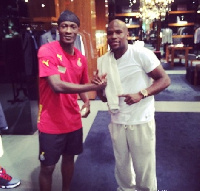 Asamoah Gyan and Floyd Mayweather