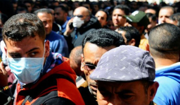 Egyptians who are traveling abroad gather in front of the Egyptian Central Public Health Laboratorie