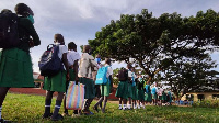 Ombaka Primary School pupils line up for temperature screening in Nyando, Kisumu(ONDARI OGEGA | NMG)