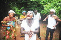 People praying at the Achimota Forest