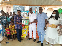 George Yaw Nkansah presenting the items to the orphanage