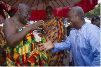 President John Mahama in a handshake with Nana Akufo-Addo