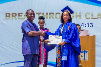 One of the students receiving her certificate