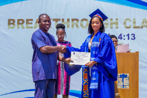 One of the students receiving her certificate