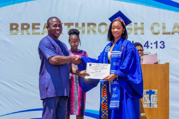 One of the students receiving her certificate