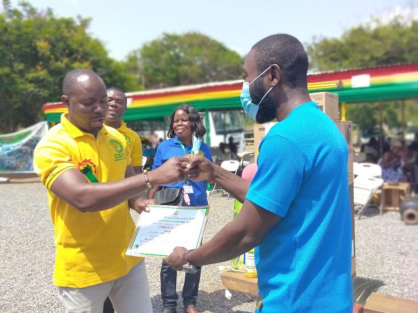 Gideon Buemor Apetorgbo, a Nation Builders Corps trainee receives award