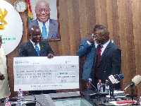 The cheque was presented to the Ministry of Lands and Natural Resources