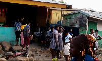 Students buying food from a nearby 'chop bar'