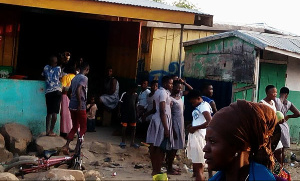 Students buying food from a nearby 'chop bar'