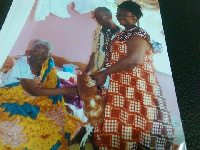 An old lady receiving some gifts from the Nkansah family