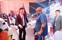 Deputy Communications Minister, George Andah and some Huawei officials at the event