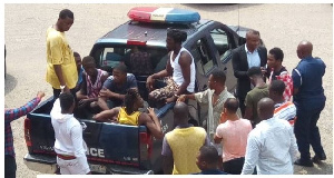 The police vehicle conveying suspects to the court